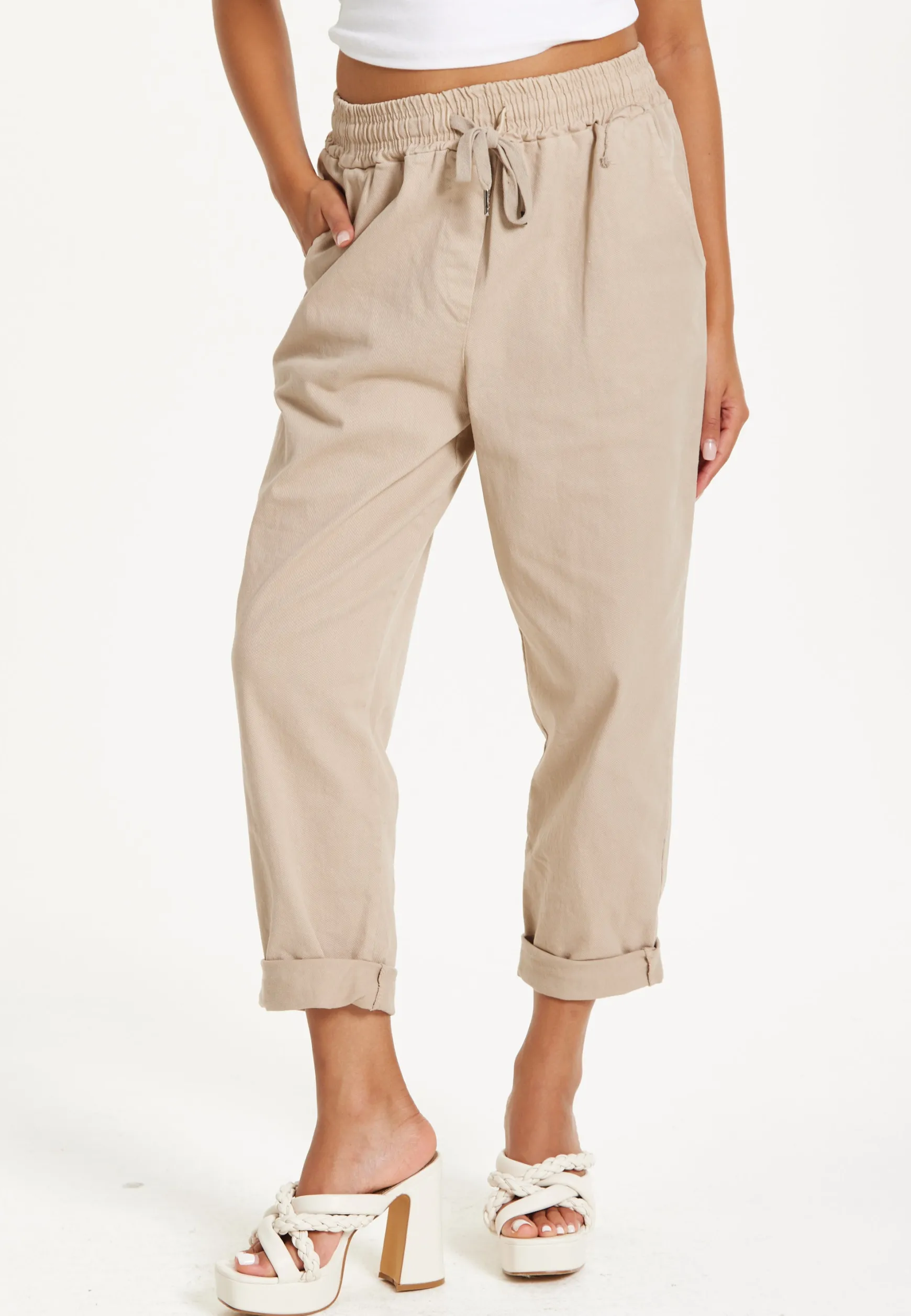 Beige Relaxed Fit Tapered Trousers