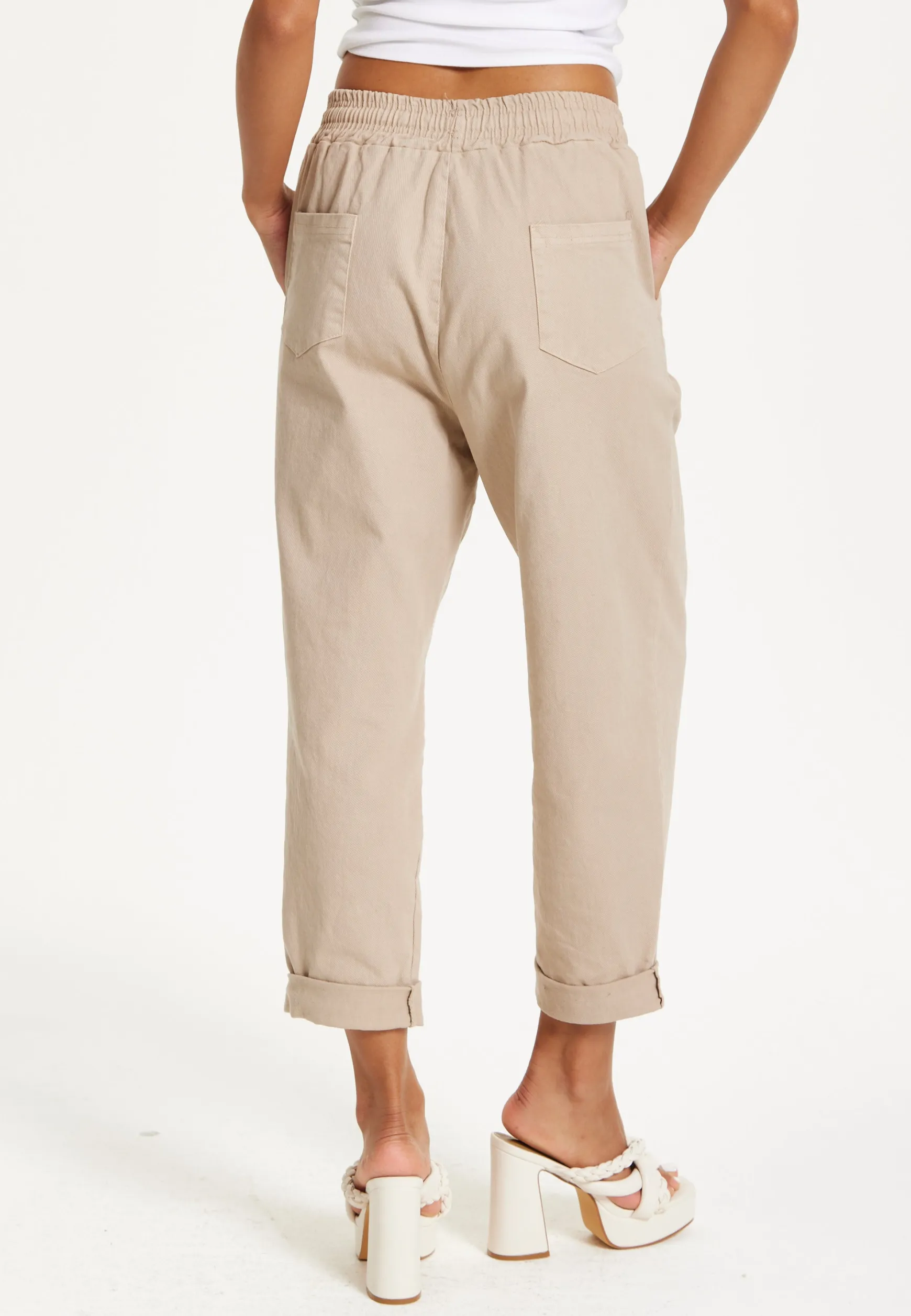 Beige Relaxed Fit Tapered Trousers