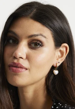 Liquorish Mini Hoop Heart Earrings In Pearl White And Gold