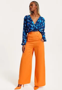 Women's Abstract Print Wrap Top In Pink, Orange, And Blue - Crossover Front, V Neck, Long Sleeves, Elasticated Waist