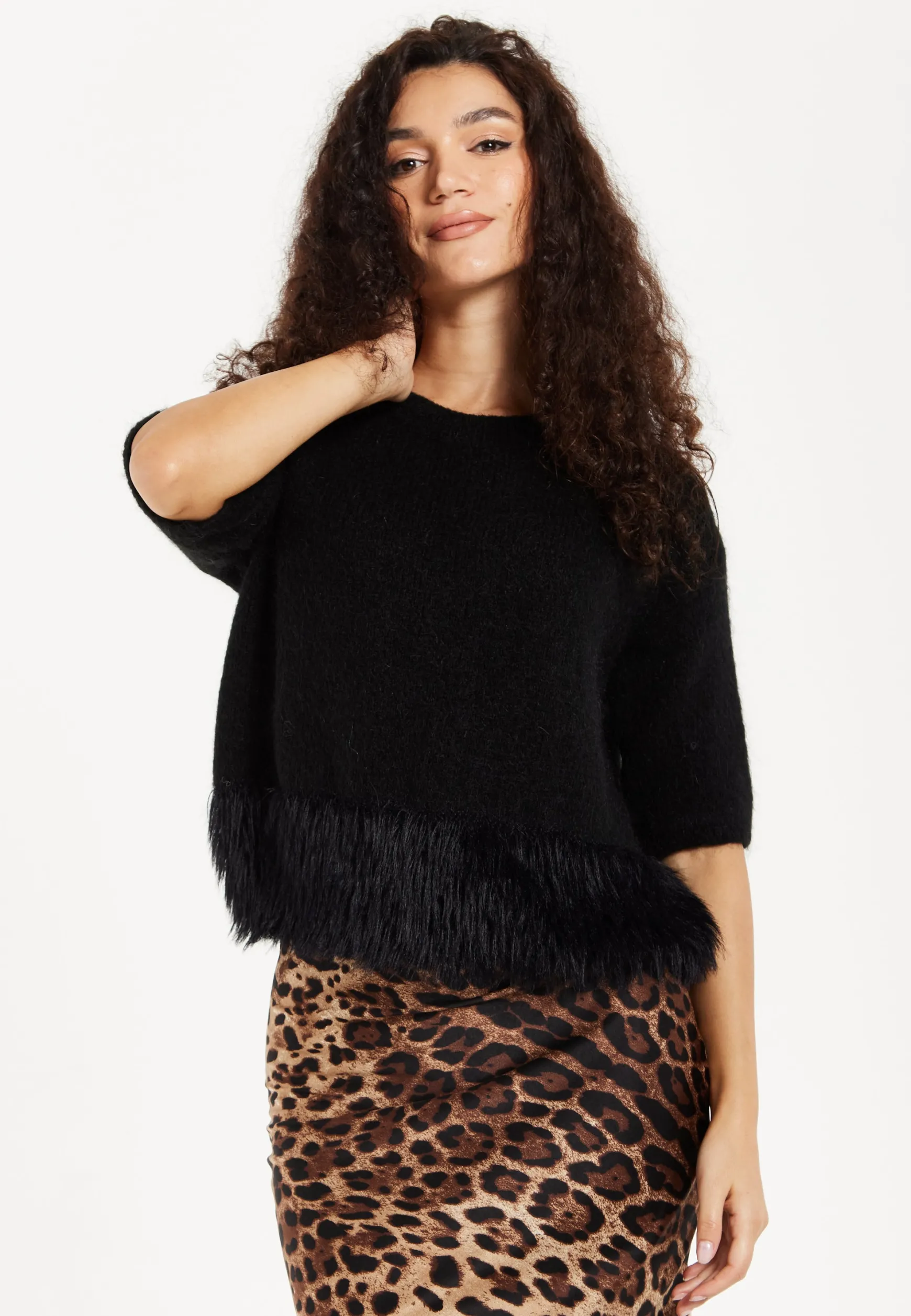 Women's Black Short Sleeves Jumper with Unique Hem Details for Comfortable Loose Fit