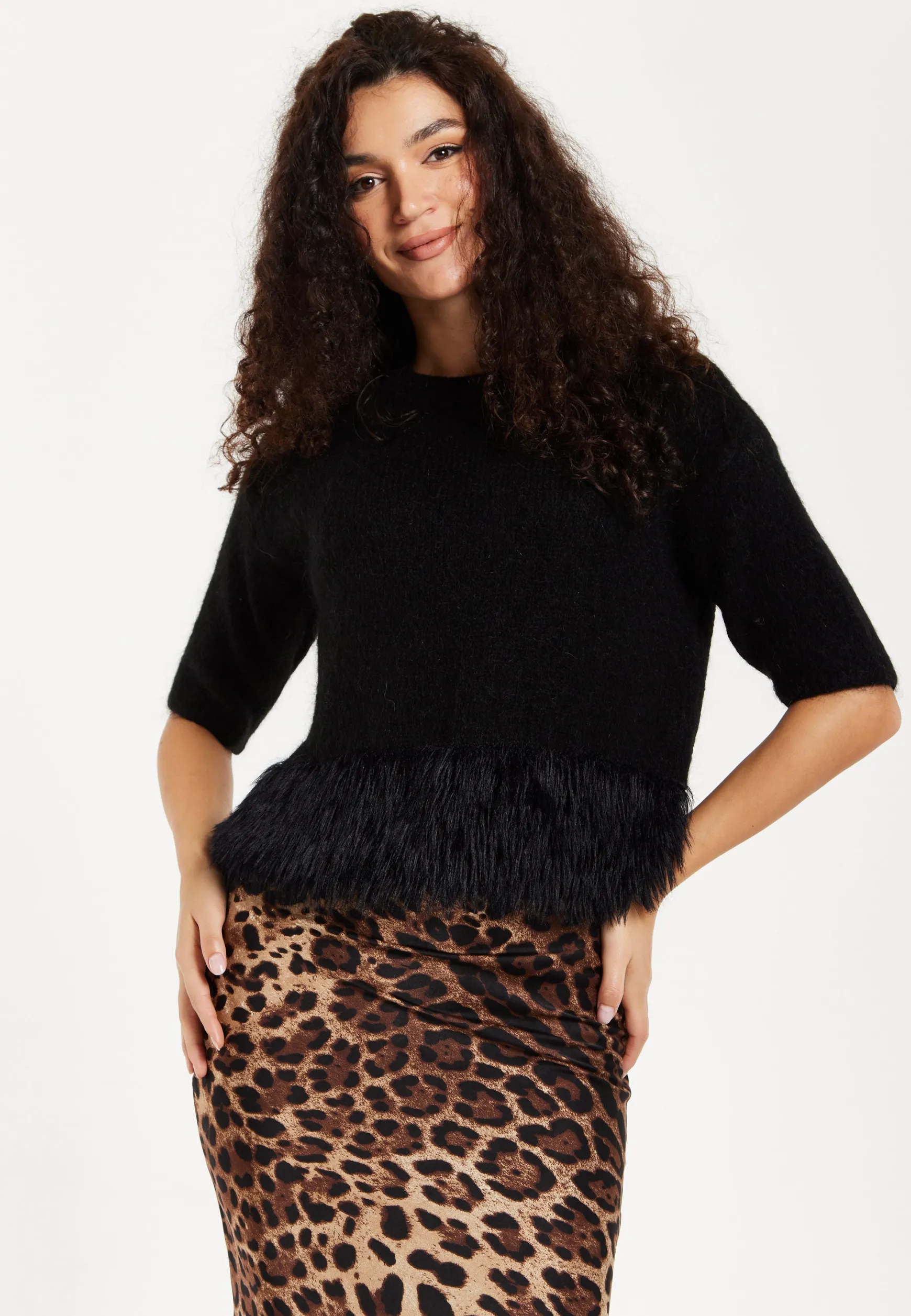 Women's Black Short Sleeves Jumper with Unique Hem Details for Comfortable Loose Fit