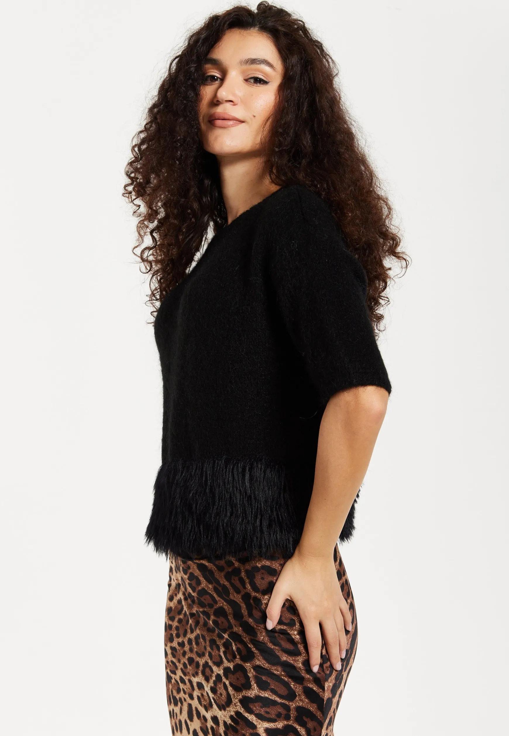 Women's Black Short Sleeves Jumper with Unique Hem Details for Comfortable Loose Fit