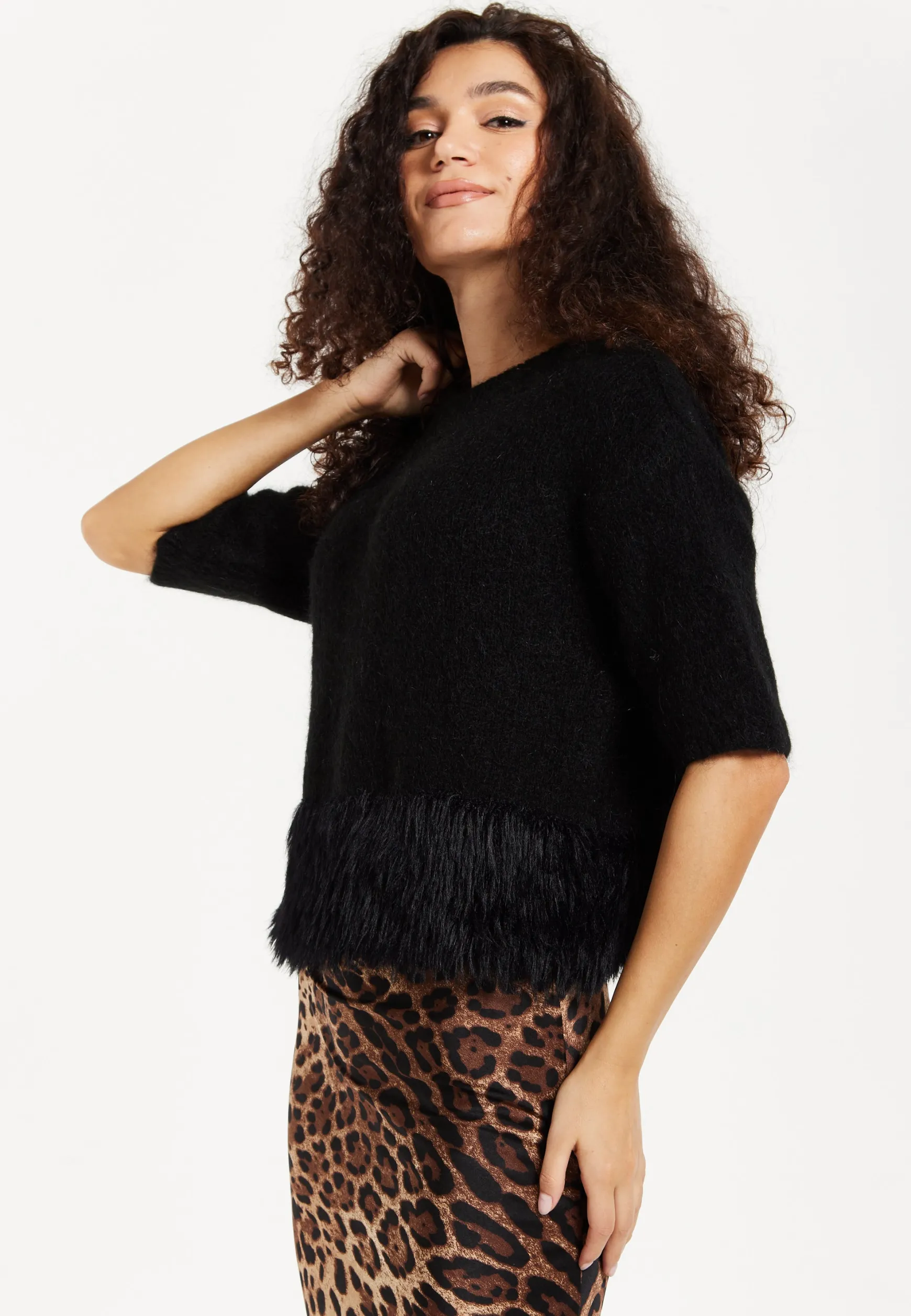 Women's Black Short Sleeves Jumper with Unique Hem Details for Comfortable Loose Fit