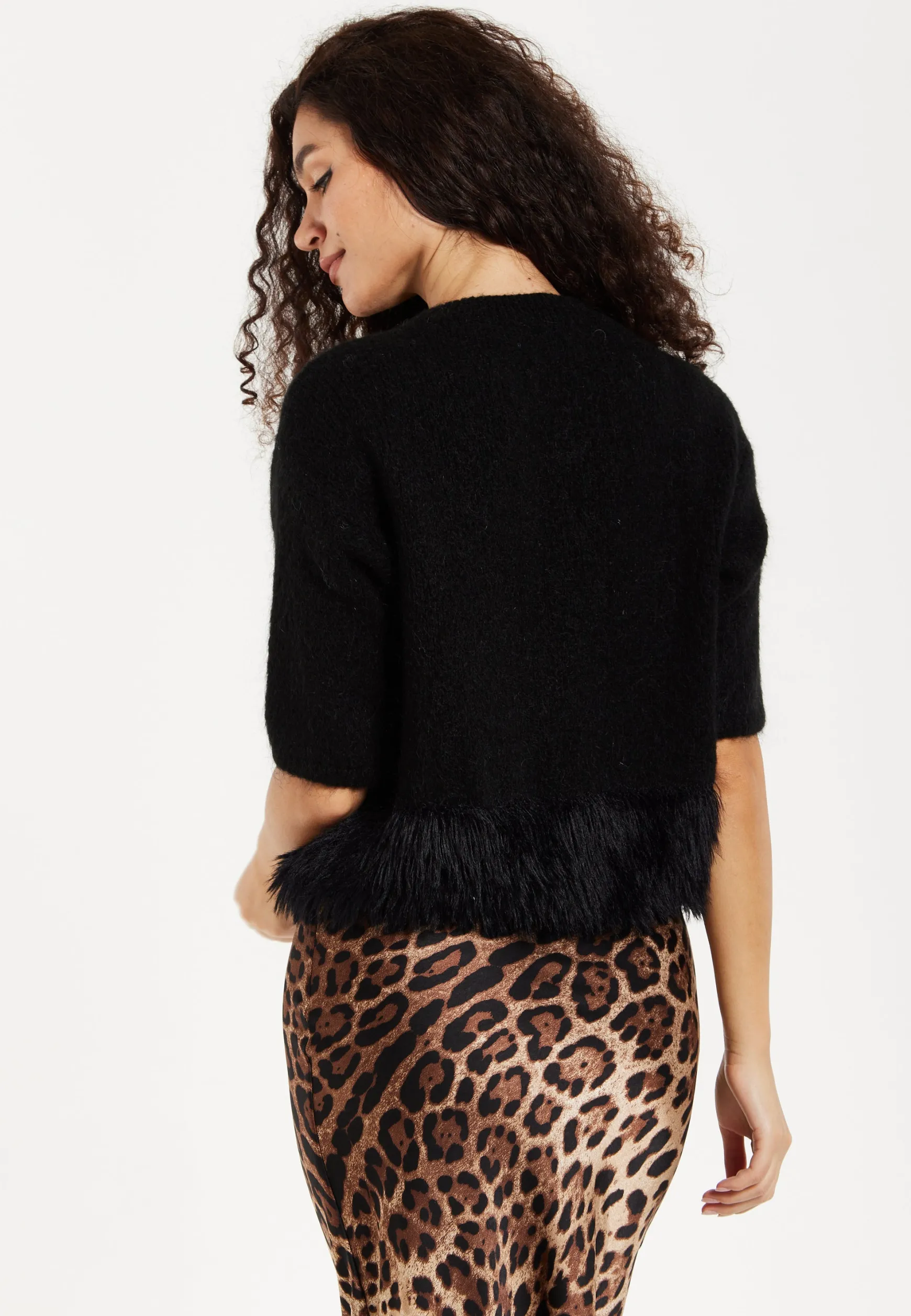 Women's Black Short Sleeves Jumper with Unique Hem Details for Comfortable Loose Fit