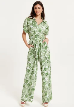 Women's Green Leaf Printed Loose Fit Jumpsuit with Tie Waist and Pocket Details - Liquorish