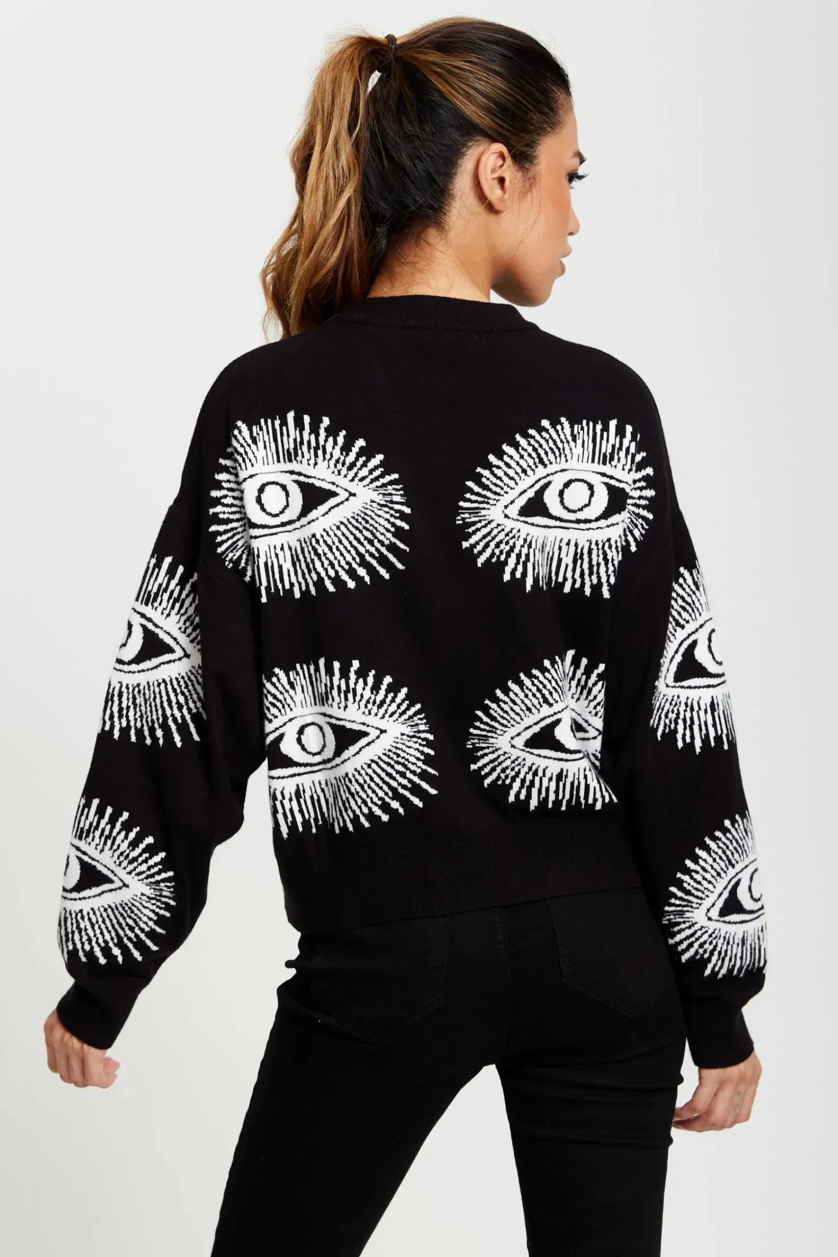 Women's Jumper in Black with Long Sleeves and Eye Pattern Design by Liquorish