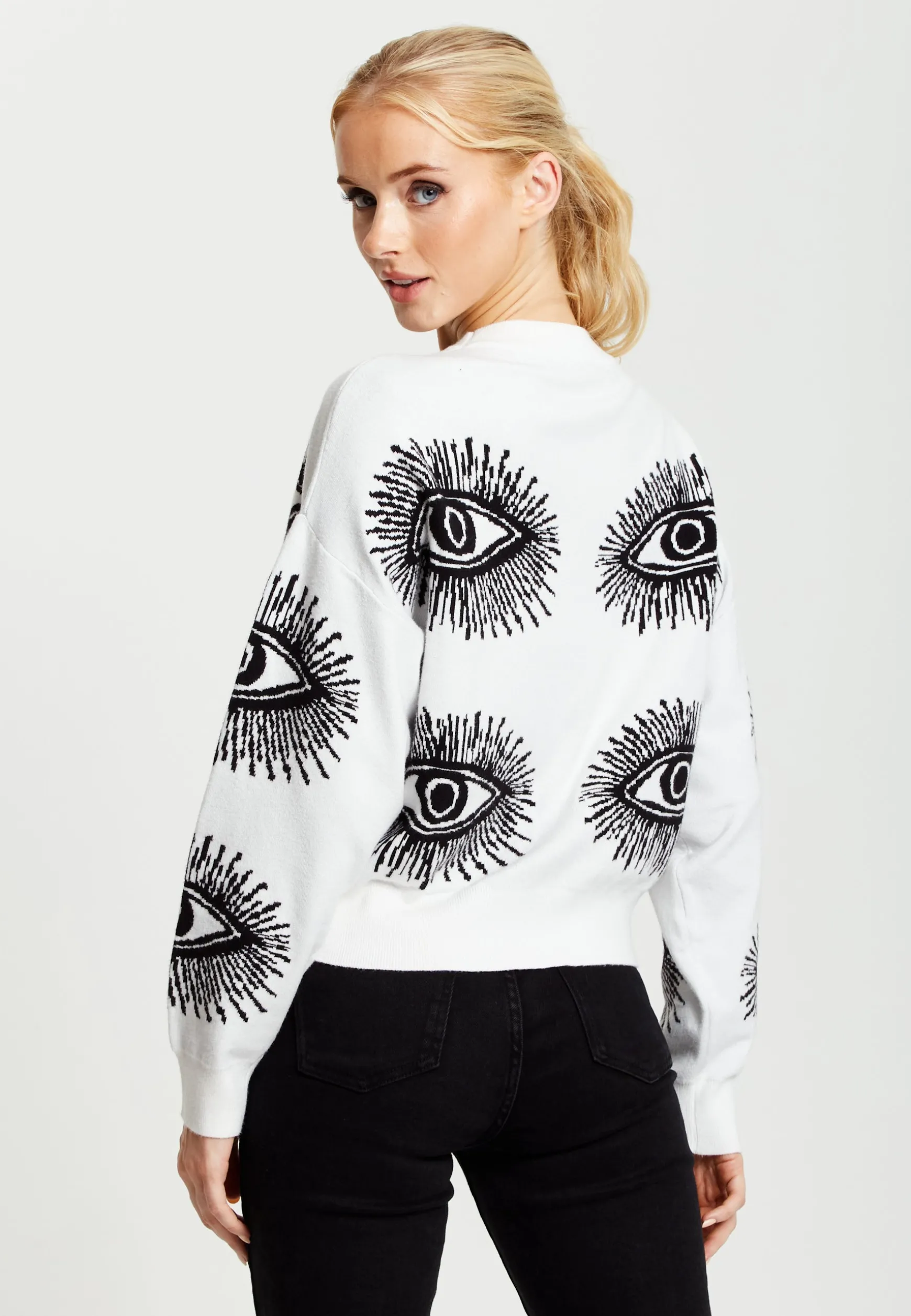 Women's Jumper in White with Long Sleeves and Distinctive Eye Pattern by Liquorish