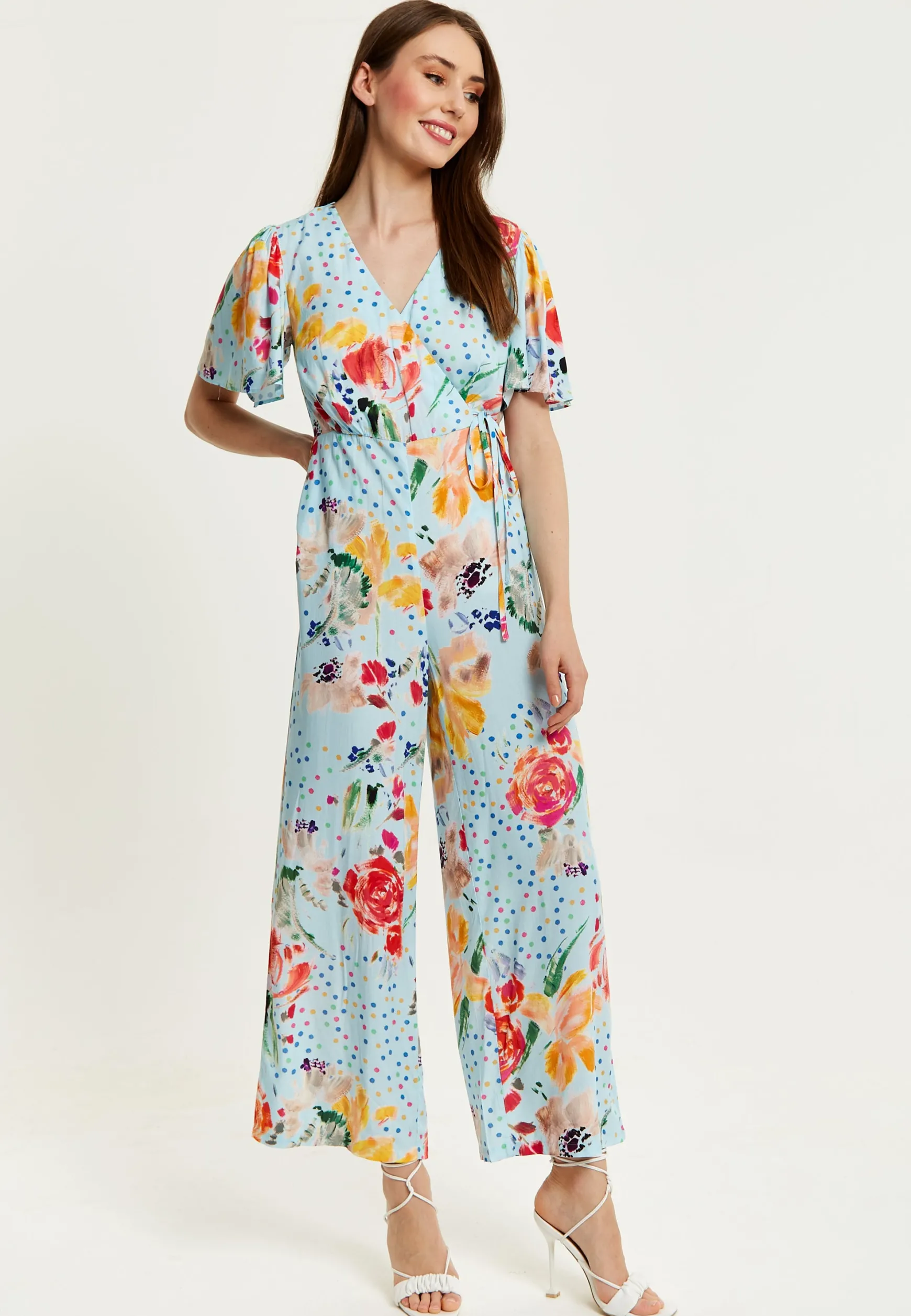Women's Jumpsuit - Blue Floral Crossover V Neck with Tie Waist and Wide Legs - Liquorish