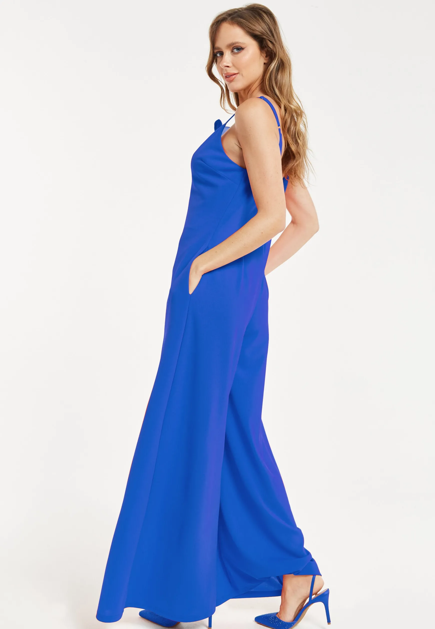 Women's Jumpsuit - Elegant Blue with Floral Shoulder Detail, Deep V-Neck, Wide-Leg Silhouette, Side Pockets, Liquorish