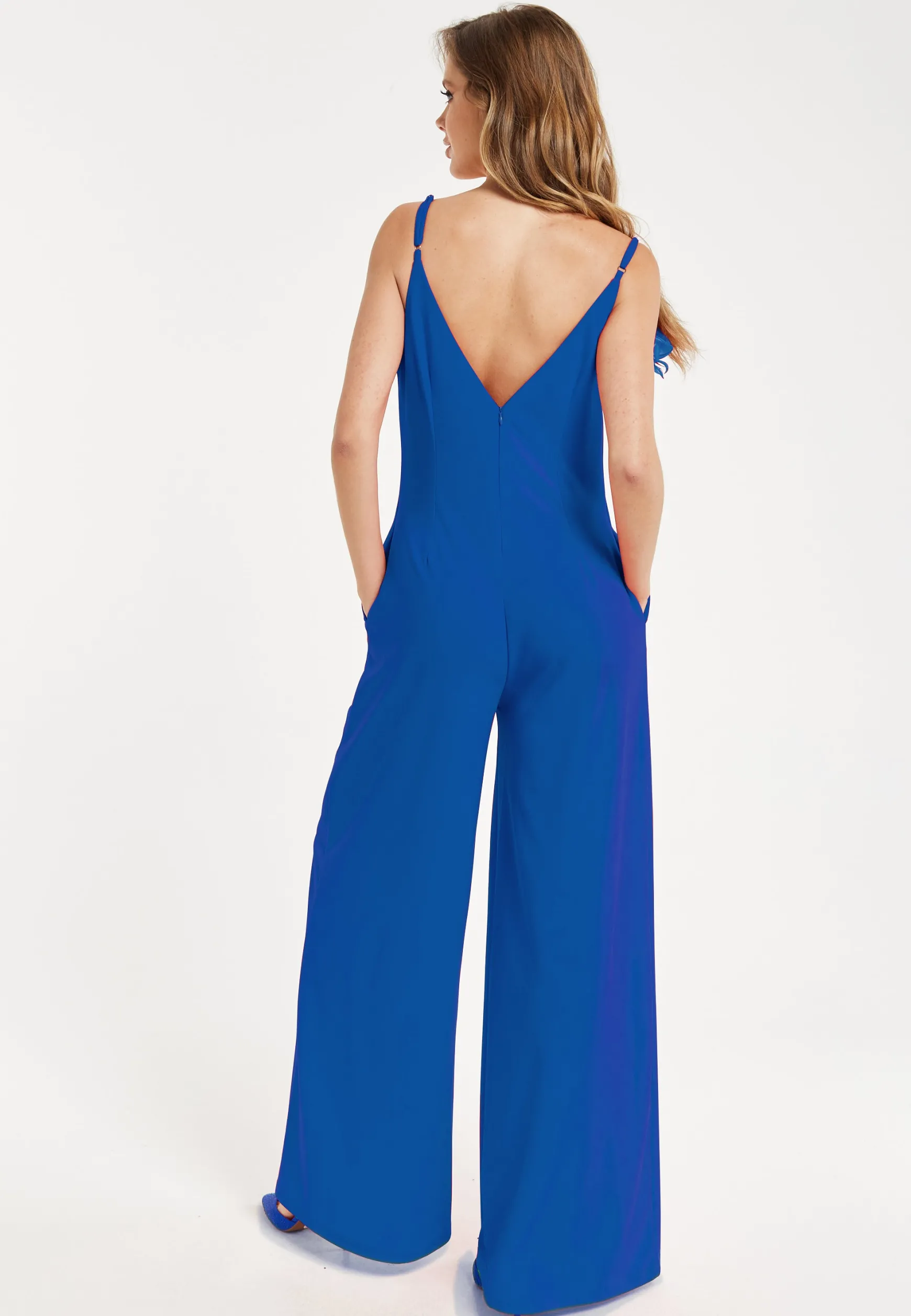 Women's Jumpsuit - Elegant Blue with Floral Shoulder Detail, Deep V-Neck, Wide-Leg Silhouette, Side Pockets, Liquorish