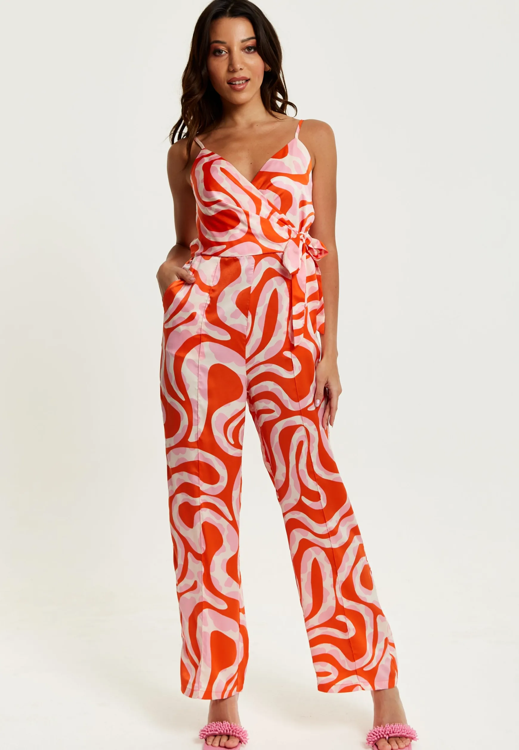 Women's Jumpsuit in Pink and Red Abstract Print with V Neck, Crossover Front, Tie Waist, Wide Legs - Liquorish