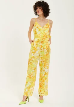 Women's Jumpsuit in Yellow and Orange Floral Print with V-Neck, Adjustable Straps, and Tie Waist - Liquorish