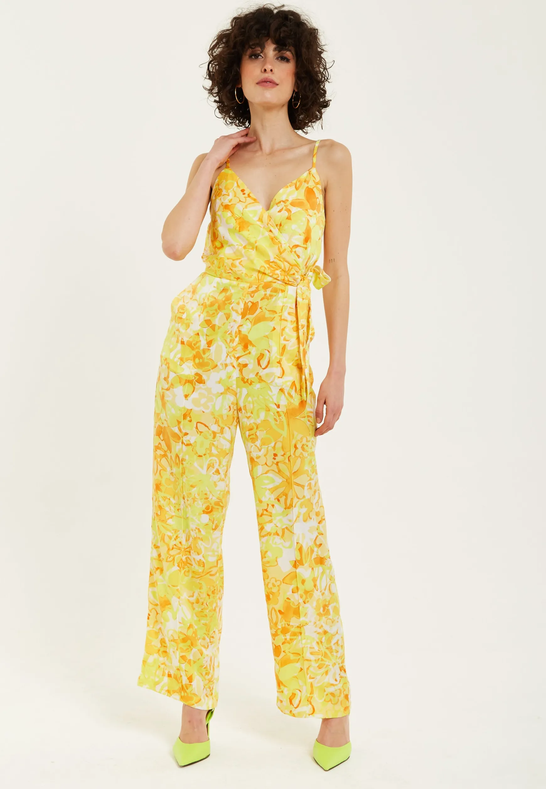 Women's Jumpsuit in Yellow and Orange Floral Print with V-Neck, Adjustable Straps, and Tie Waist - Liquorish