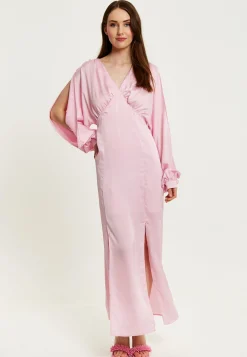 Women's Maxi Dress in Light Pink with Long Sleeve Slits - Elegant Design by Liquorish