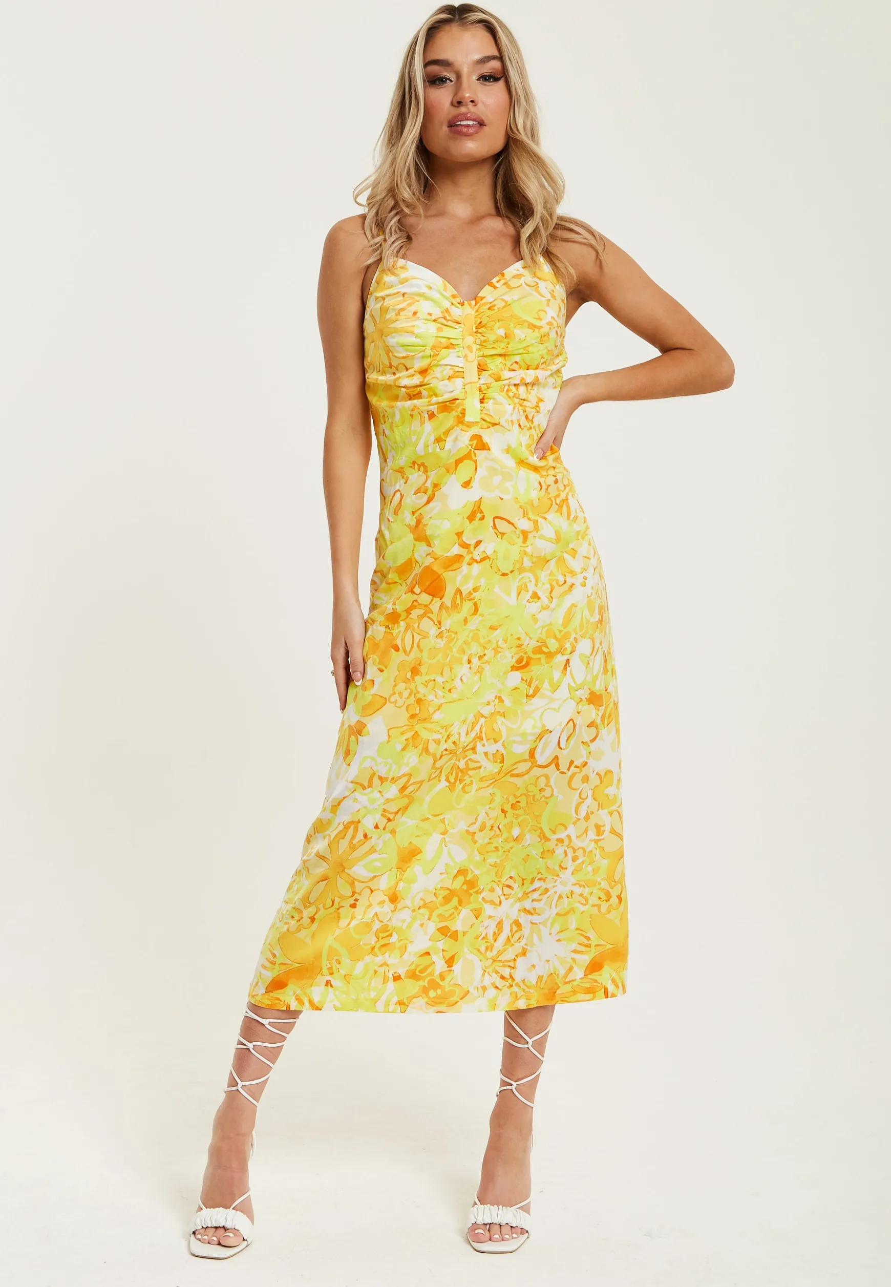 Women's Maxi Dress in Yellow and Orange Floral Print with Sleeveless Design and Ruching Detail - Liquorish