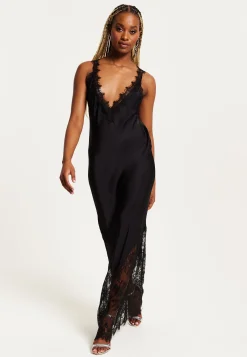 Women's Maxi Dress with Lace Detail, Deep V-Neck, and Flowing Silhouette in Black - Liquorish