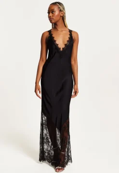 Women's Maxi Dress with Lace Detail, Deep V-Neck, and Flowing Silhouette in Black - Liquorish