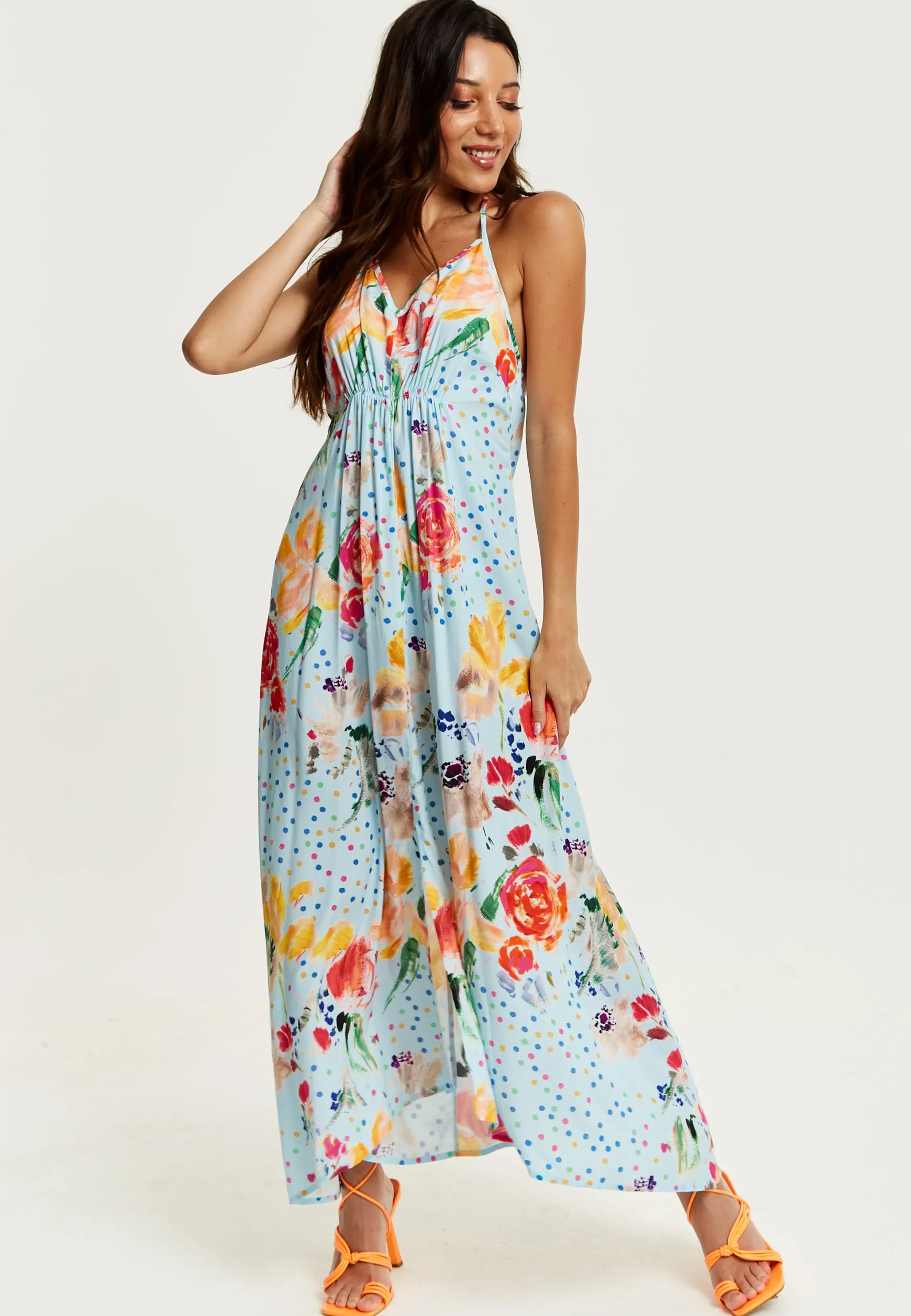 Women's Midi Dress in Blue with Floral Print, Sleeveless Asymmetrical Design and Open Back - Liquorish