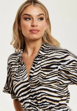 Women's Midi Dress in Brown Zebra Print with Short Sleeves and Asymmetric Hem - Liquorish