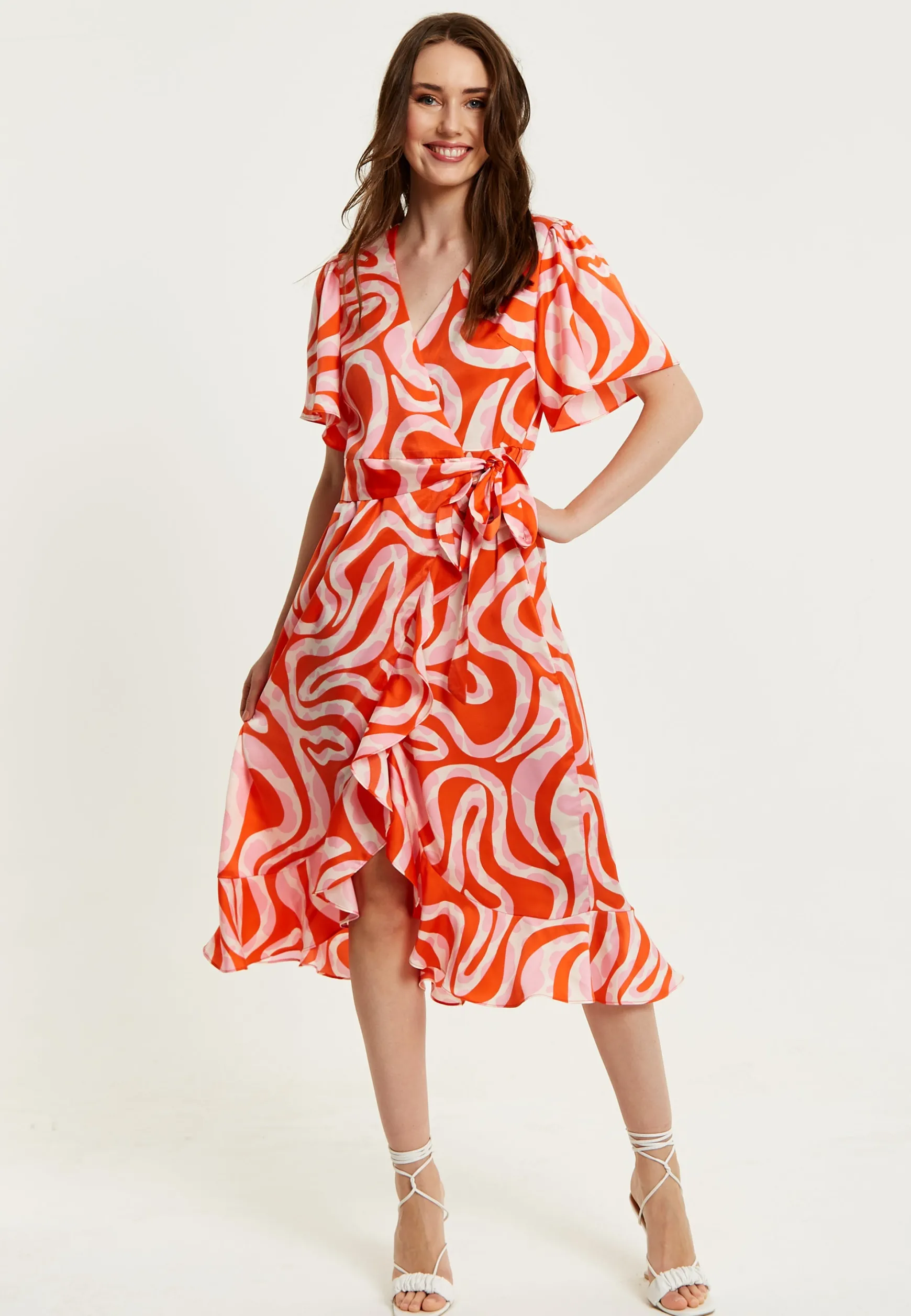 Women's Midi Wrap Dress in Pink and Red Abstract Print with Short Sleeves - Flattering V Neck and Tie Waist by Liquorish