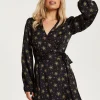 Women's Mini Dress in Black with Long Sleeves, Gold Star & Polka Dot Print Wrap Design - Liquorish