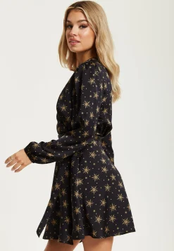 Women's Mini Dress in Black with Long Sleeves, Gold Star & Polka Dot Print Wrap Design - Liquorish