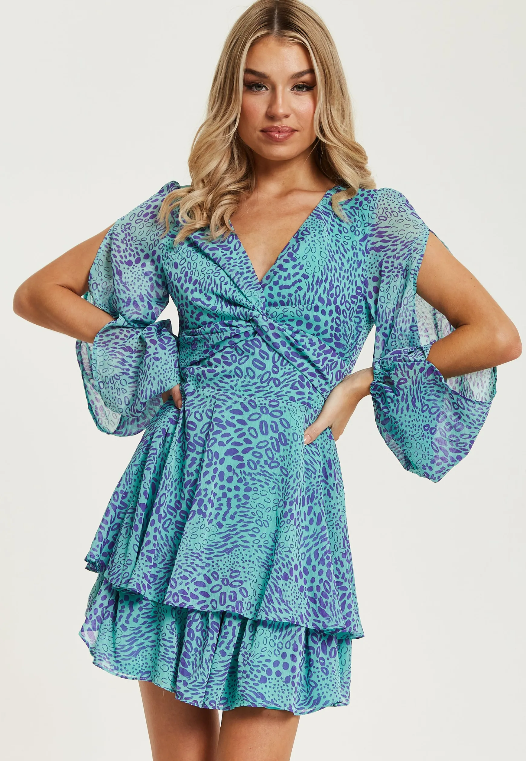 Women's Mini Dress in Blue with Long Sleeves and Knot Front Detail - Stunning Leopard Print by Liquorish