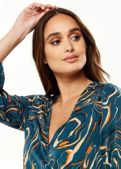 Women's Mini Dress in Dark Green with Long Sleeves and Scribble Print Wrap Style - Liquorish