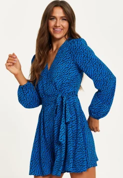 Women's Mini Dress in Royal Blue with Long Sleeves and Heart Print Wrap Design by Liquorish