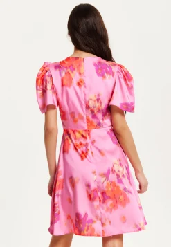 Women's Mini Dress with Angel Sleeves and Floral Print in Pink - Perfectly Chic by Liquorish