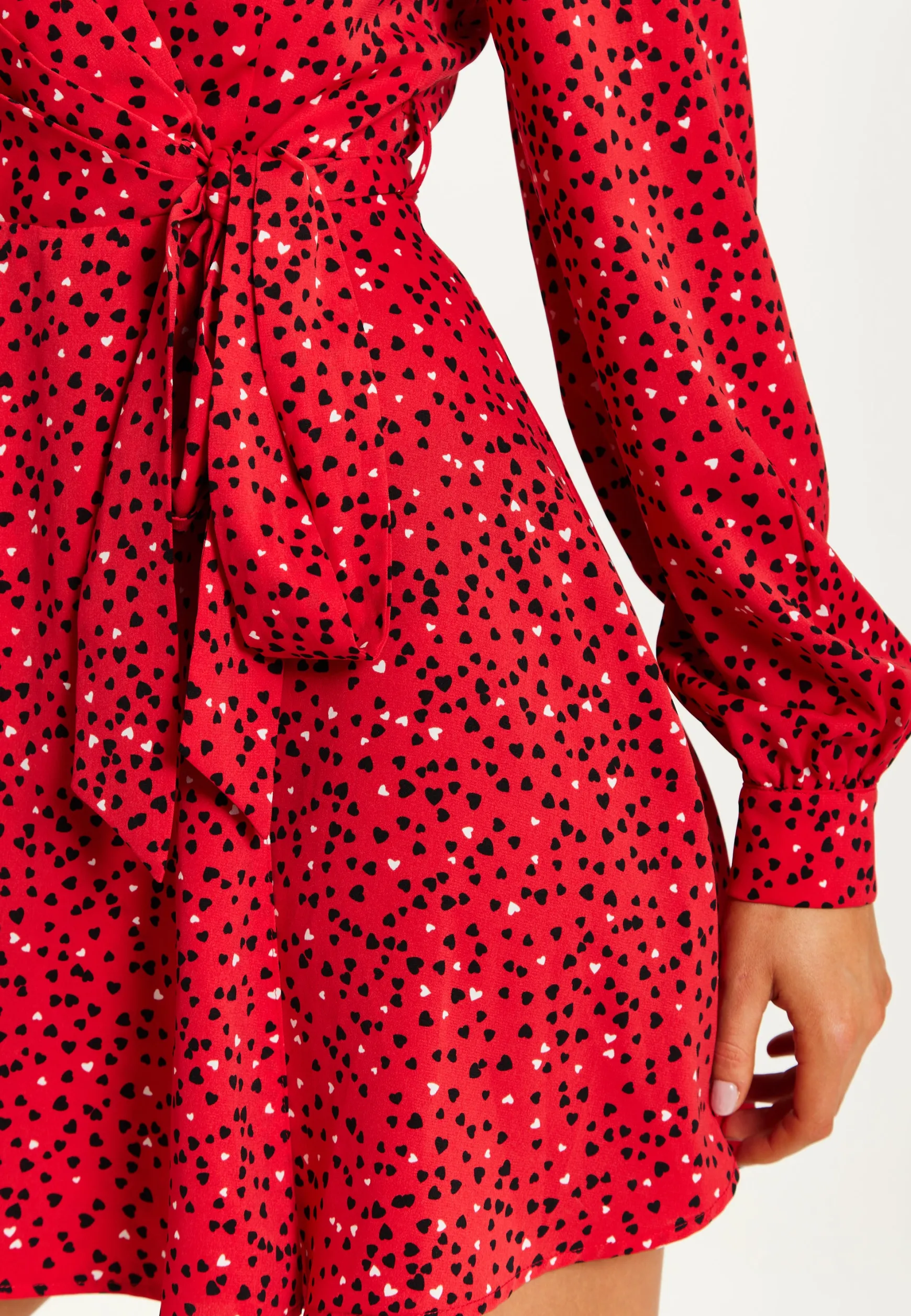 Women's Mini Dress with Long Sleeves in Red - Heart Print Wrap Style, V Neck, Adjustable Tie Waist, by Liquorish