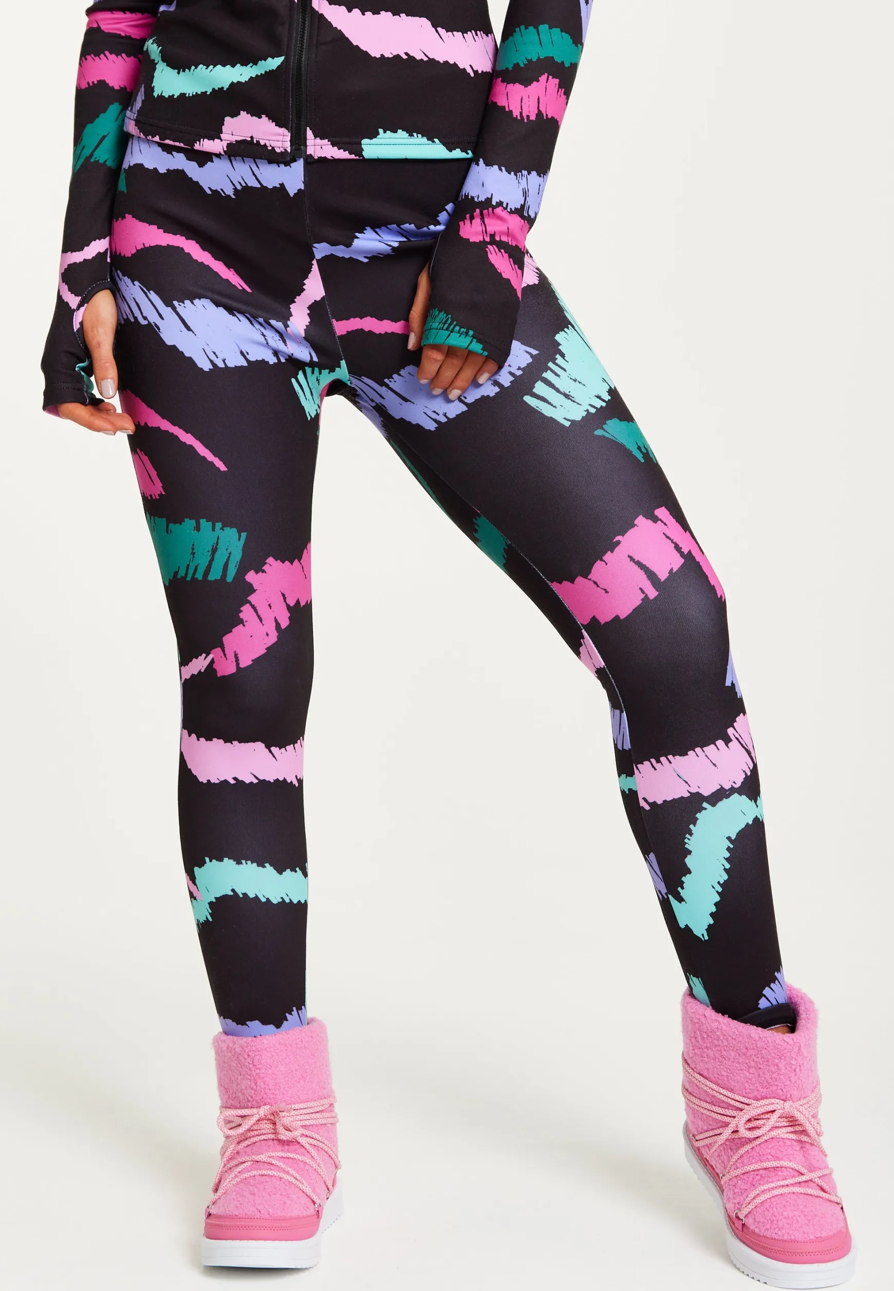 Women's Trousers in Black Abstract Print with Fleece Lining and Adjustable Stirrup Hem by Liquorish